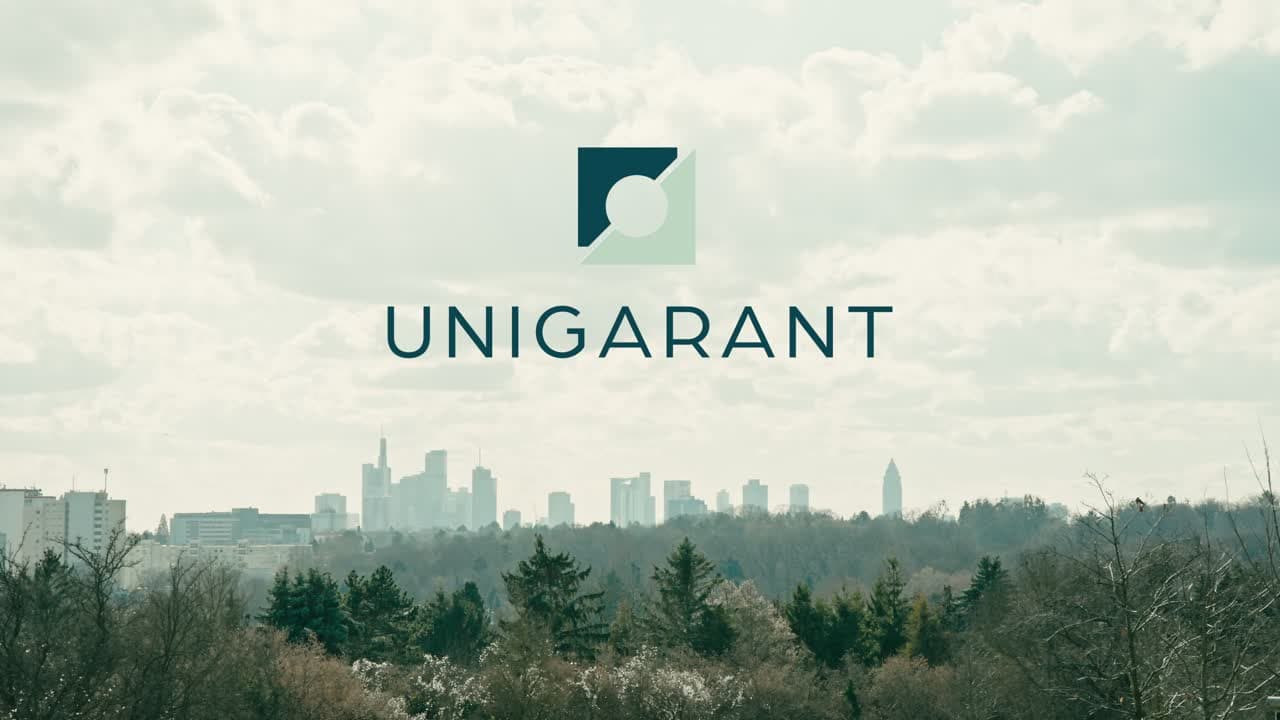 UNIGARANT corporate brand film frame in a restrained before-grade treatment.