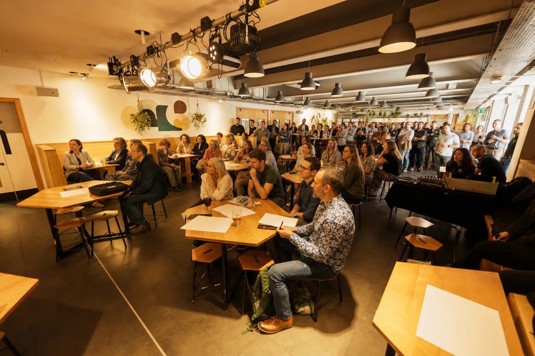 Guests gathered inside an anniversary event setting.