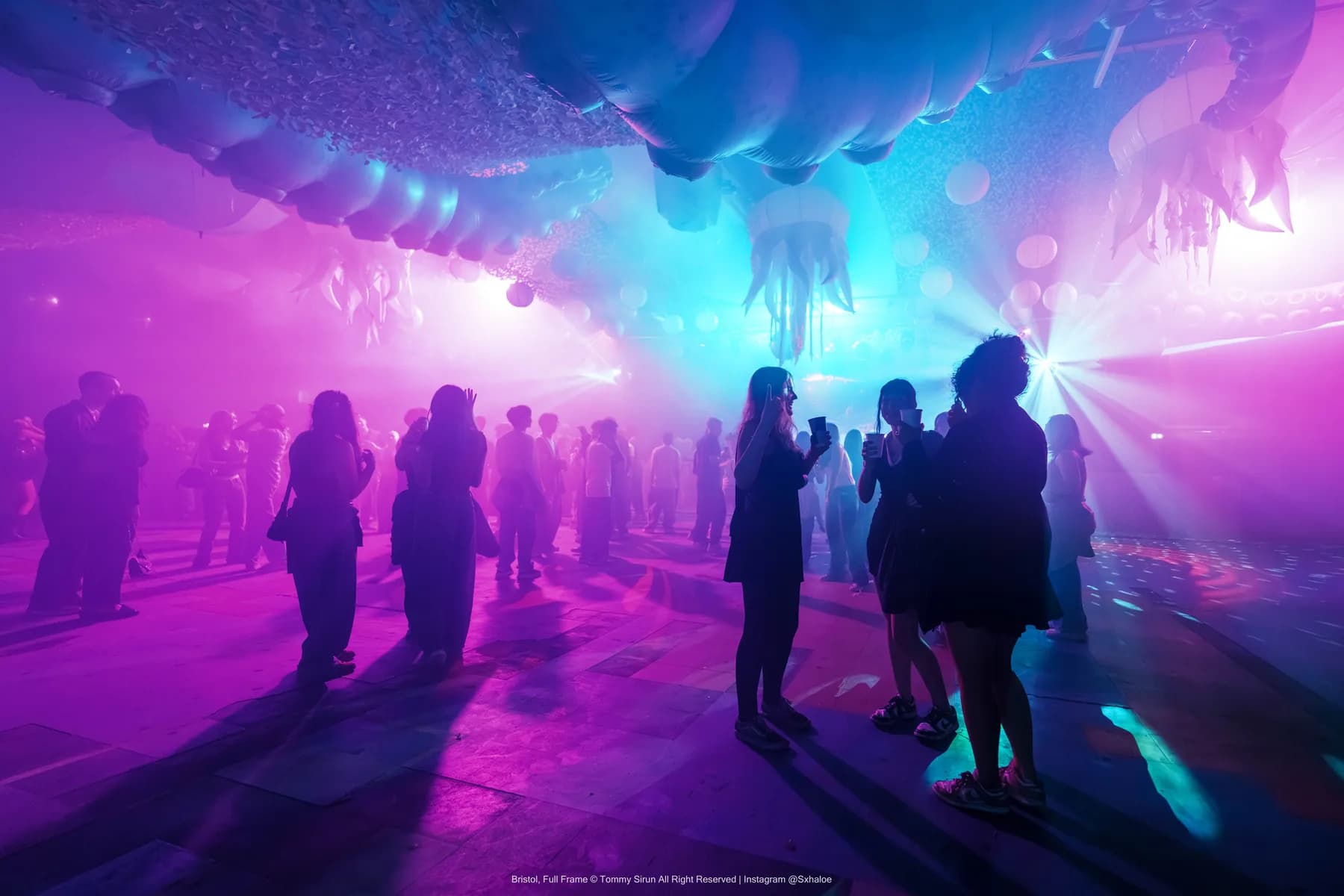 A nightlife crowd scene held under difficult club lighting.