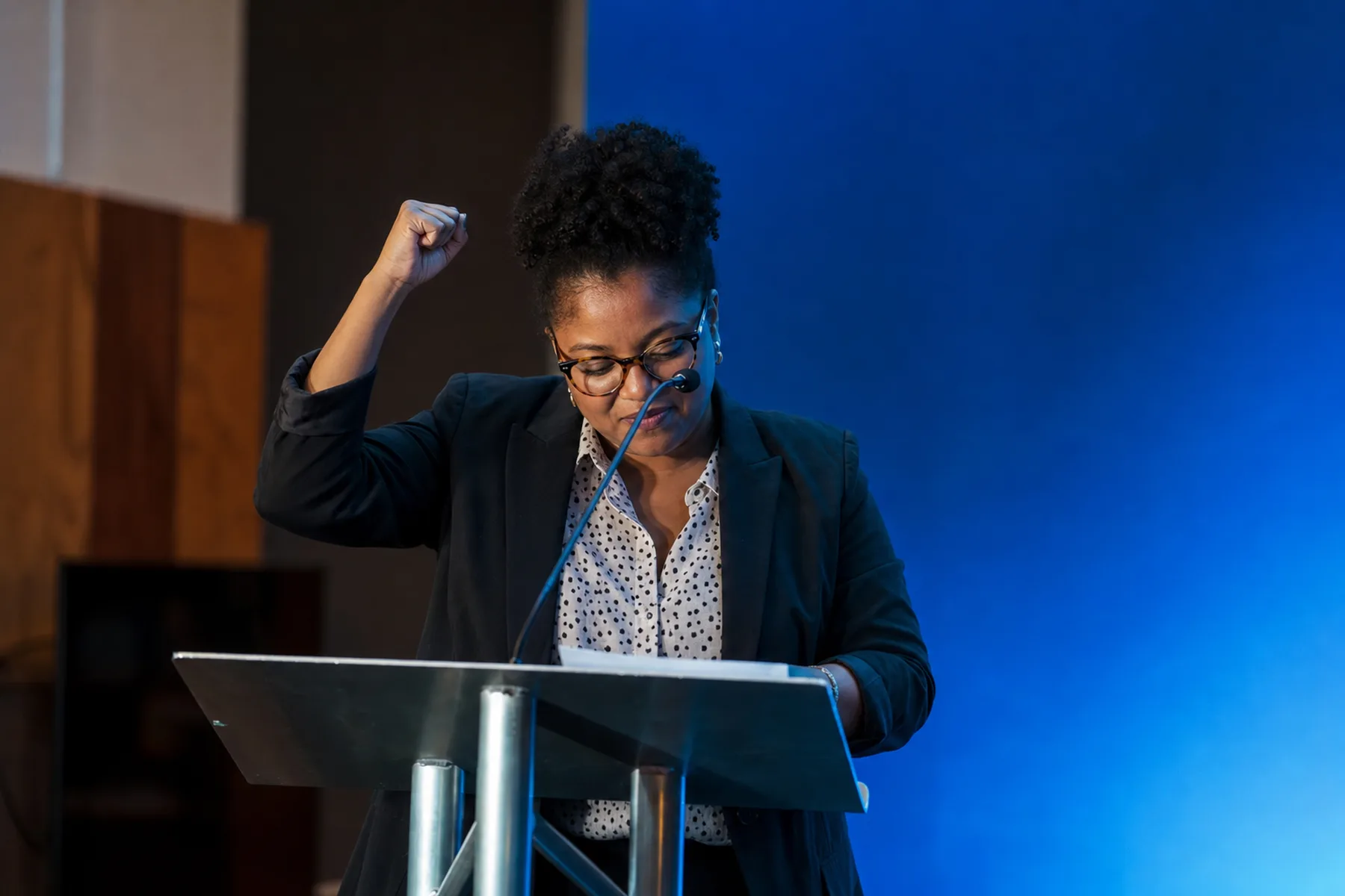 A decisive speaker moment captured during a live event programme.