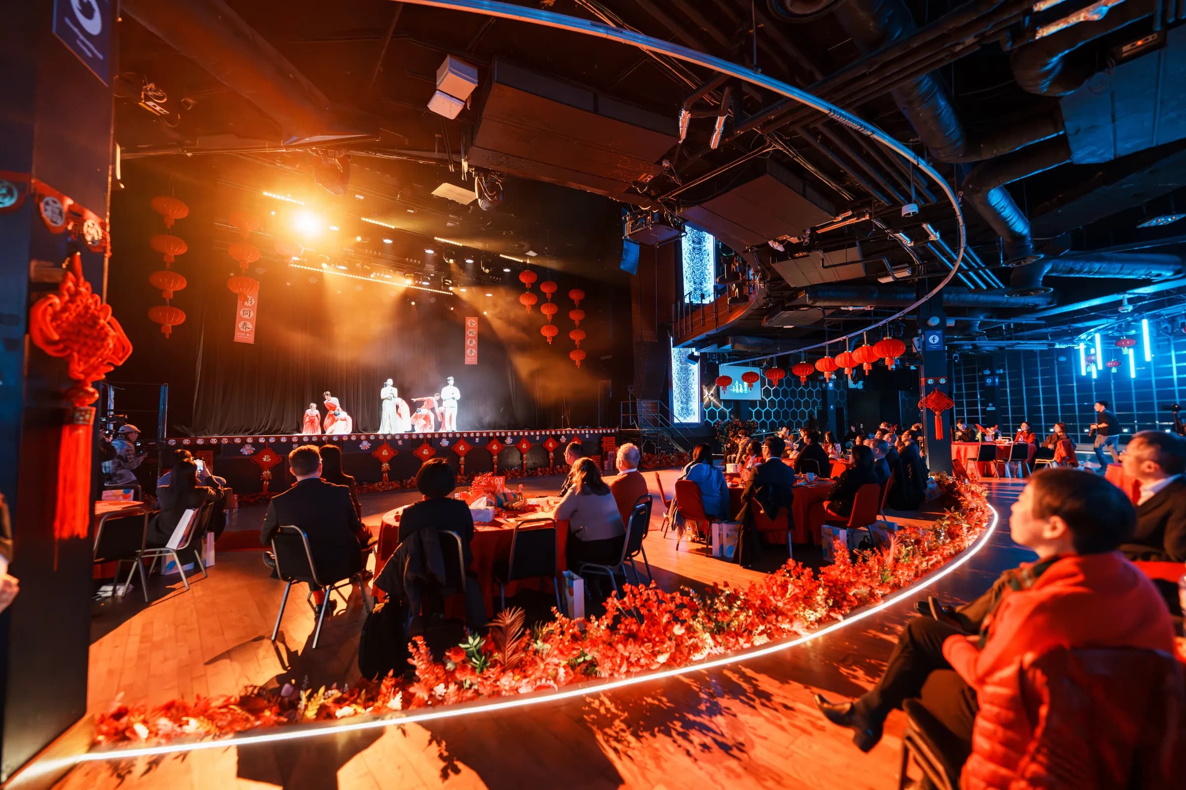A Spring Festival performance frame showing scale and venue control.